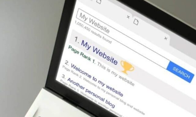 A laptop showing Google search results with a website appearing at the top